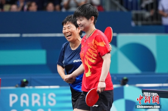 巴黎奥运乒乓赛场38岁年龄差孕育的温情对决：倪